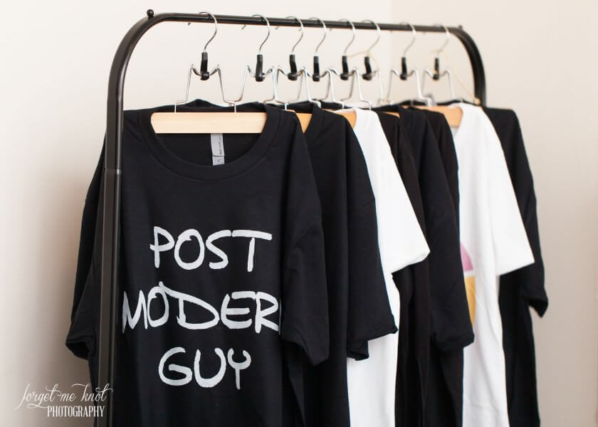 post moder tee shirt in black on hanger