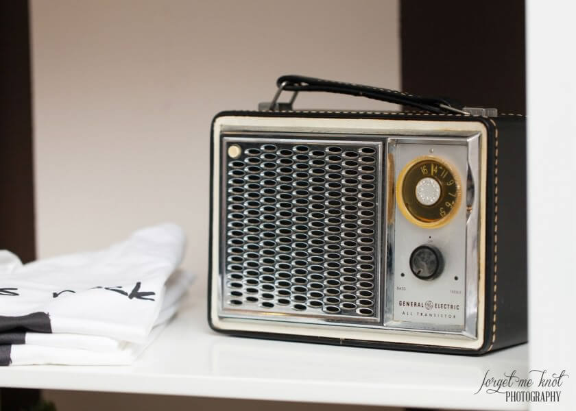 antique radio sitting on shelf