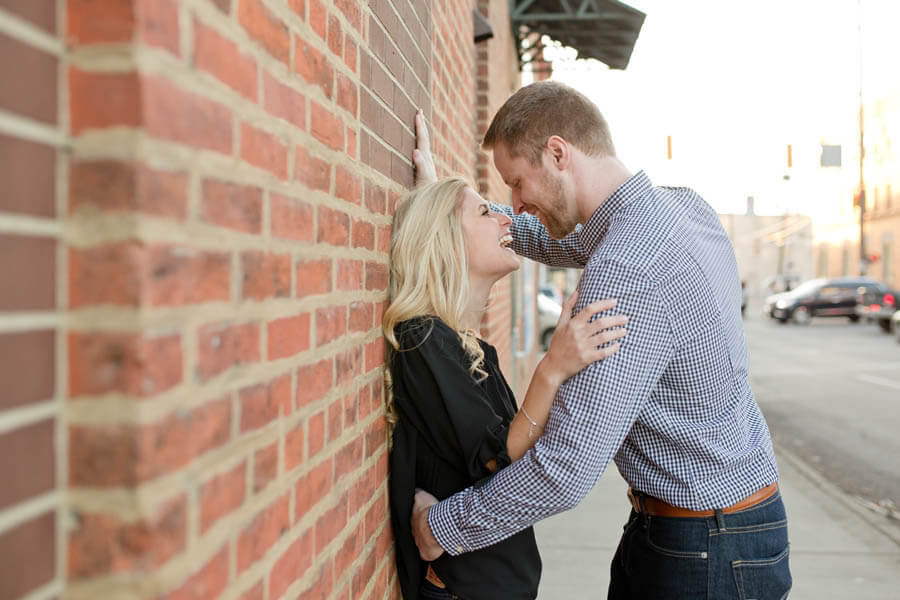 engagement photo of couple laughing in short north columbus ohio
