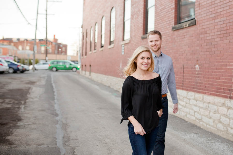 engagement photo of couple walking in short north
