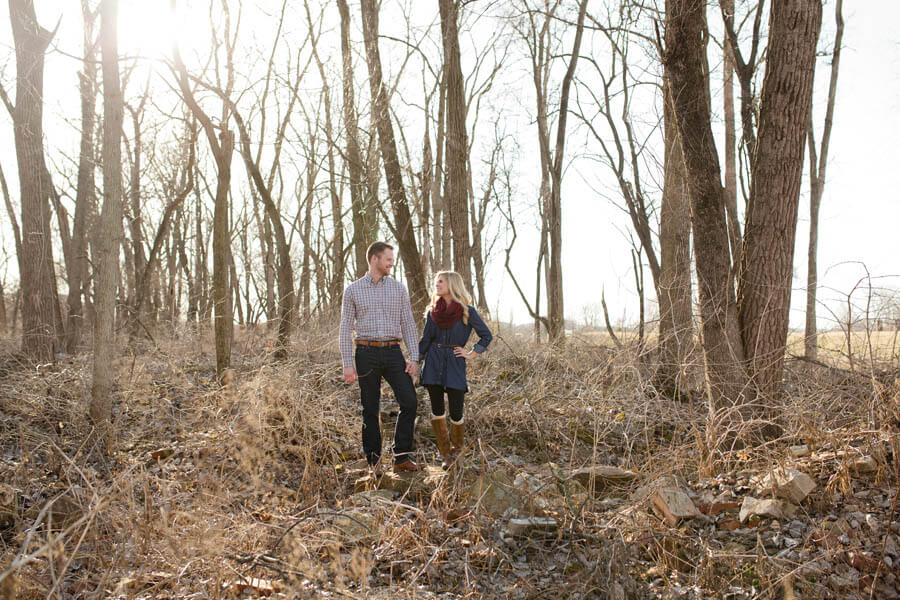 engagement photo of couple smiling at each other