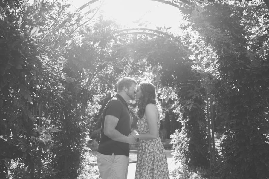 engaged couple kissing at Inniswood Metro Gardens