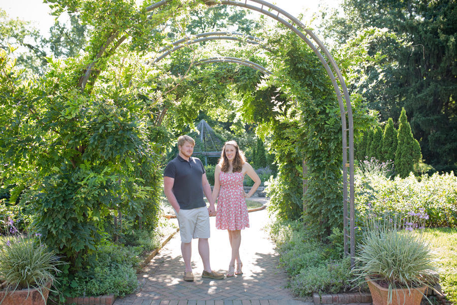 engaged couple holding hands Inniswood Metro Gardens