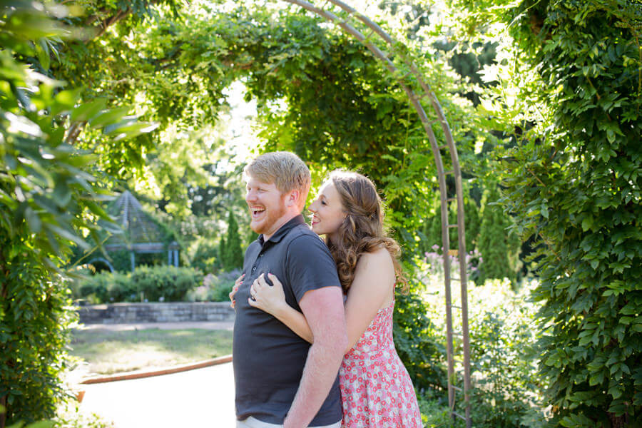 engaged couple hugging at Inniswood Metro Gardens