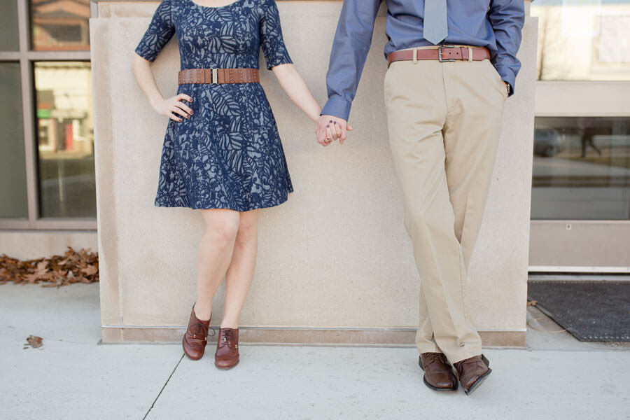 engagement photo of couple holding hands at Ohio State University