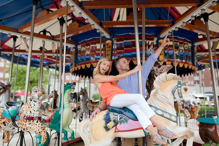 Schiller Park Engagement - Columbus Wedding Photographer - Having Fun On Carousel 