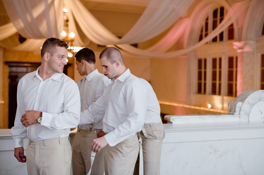 groomsmen helping groom get ready at the Vault Columbus Ohio
