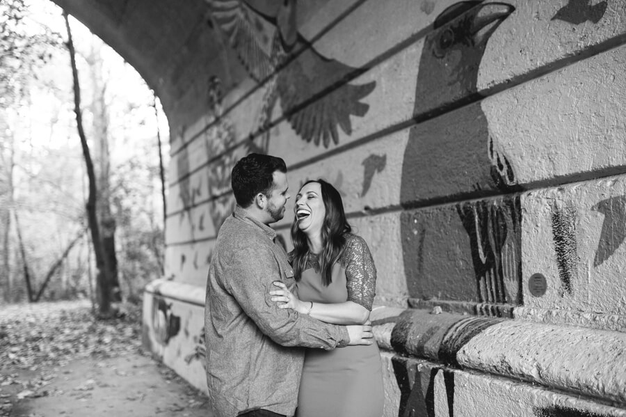 black and white photo of engaged couple laughing at Stauf's Grandview Engagement