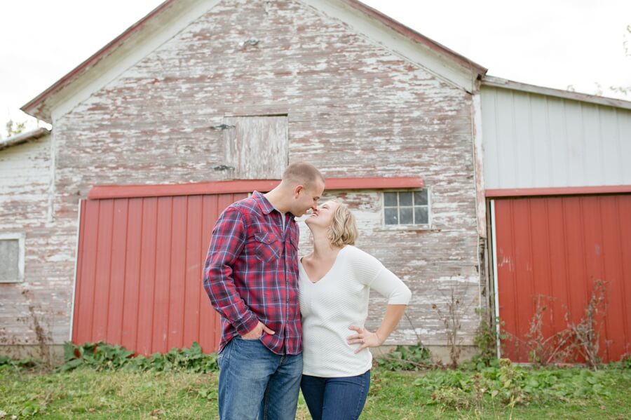 engaged couple laughing at columbus ohio farm