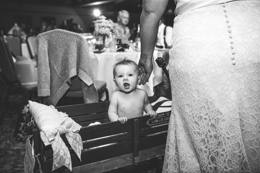 baby at wedding reception