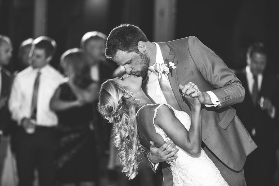 bride and groom kissing during first dance