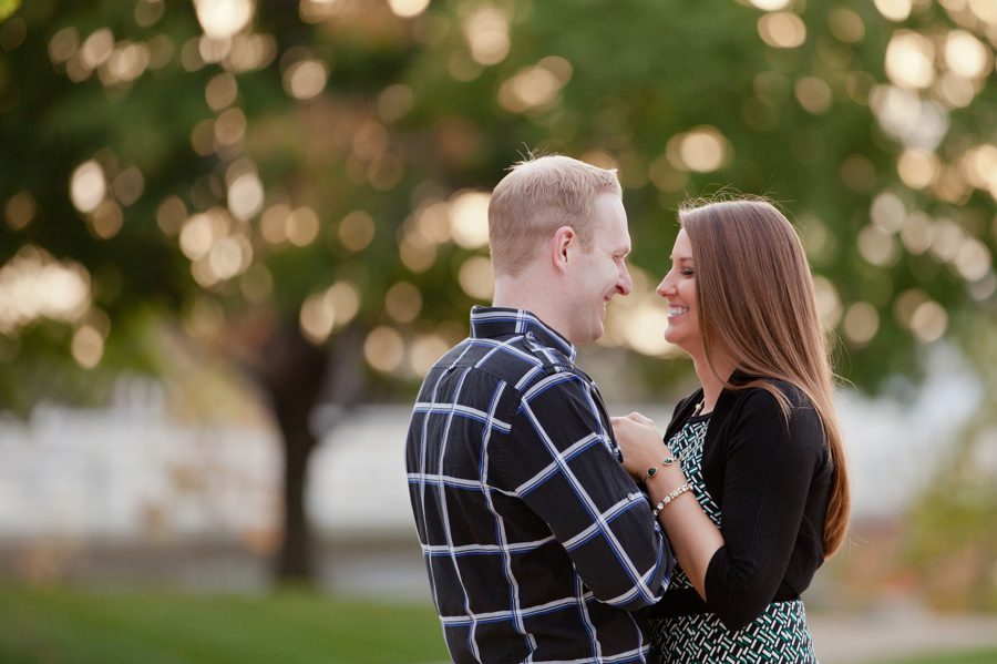 engaged couple laughing at scioto mile