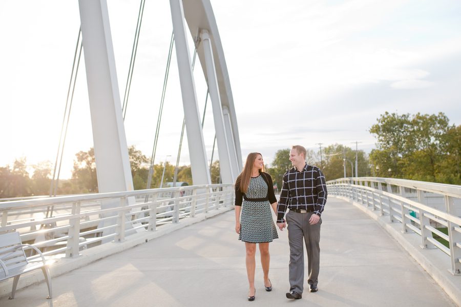 engaged couple holding hands at scioto mile