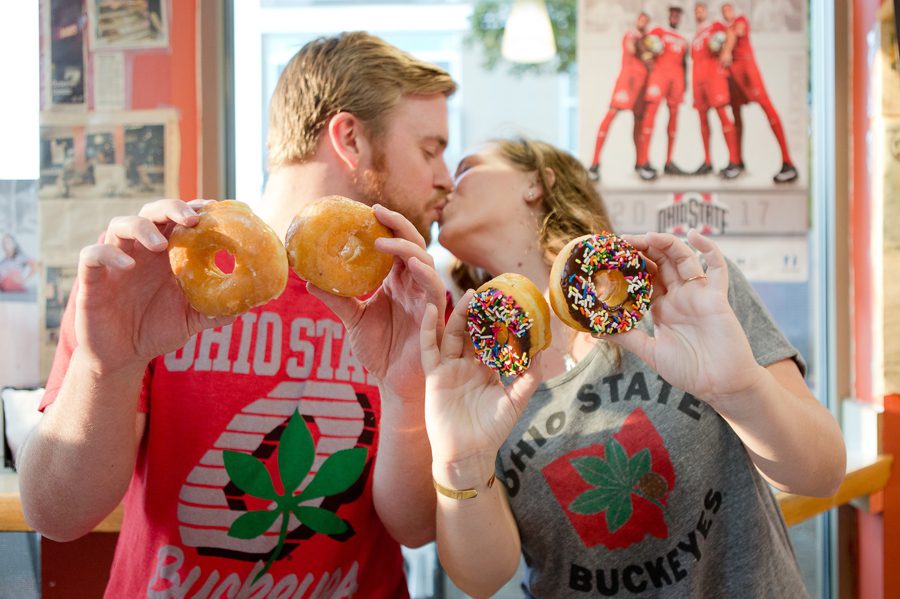 engaged couple at buckeye donuts on osu campus