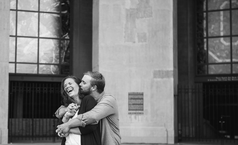 engaged couple laughing at osu stadium