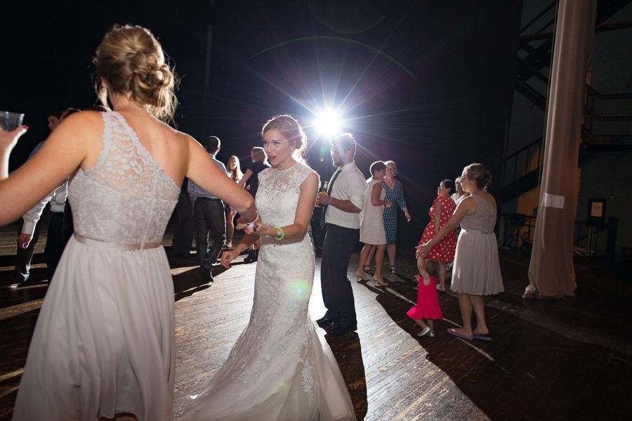bride dancing with maid of honor