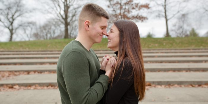 engaged couple eskimo kisses at Franklin Park Conservatory