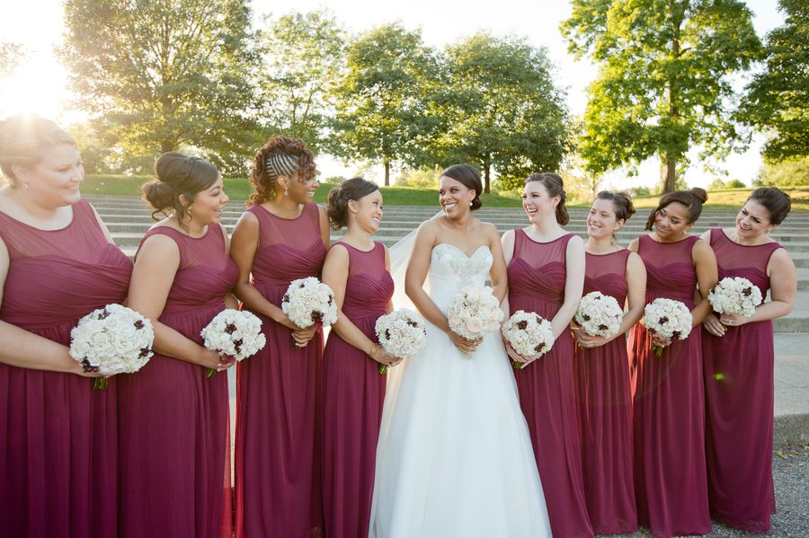 bride with bridesmaids laughing
