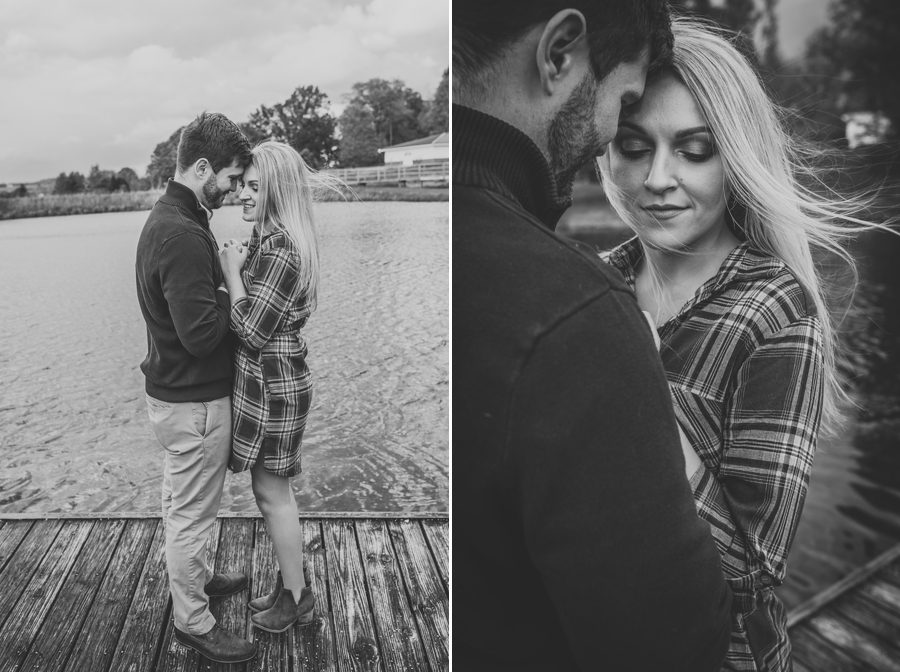black and white photo of engaged couple on dock