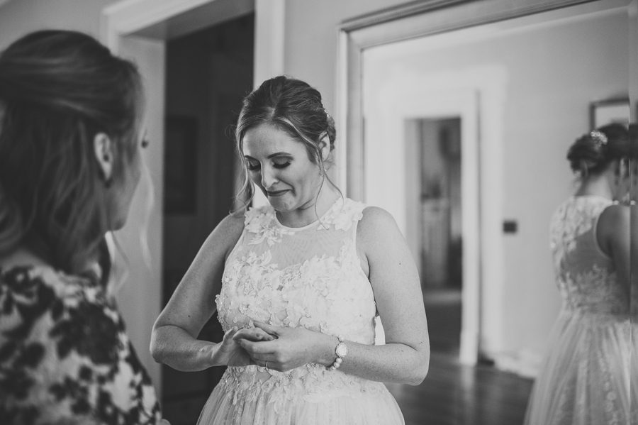 bride receiving gift from mother