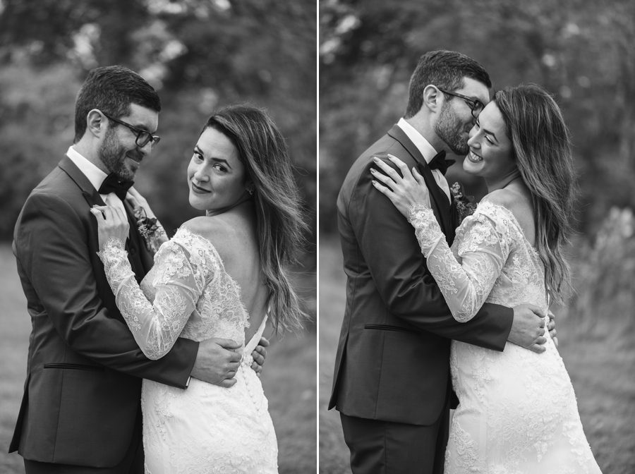 black and white photo of groom kissing brides ear at jorgensen farm