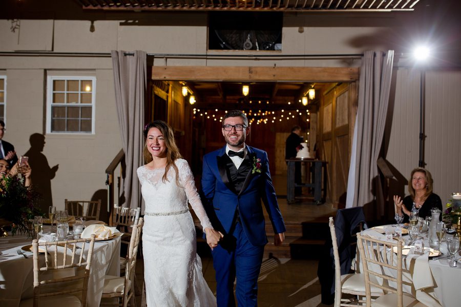 bride and groom announced into jorgensen farm reception
