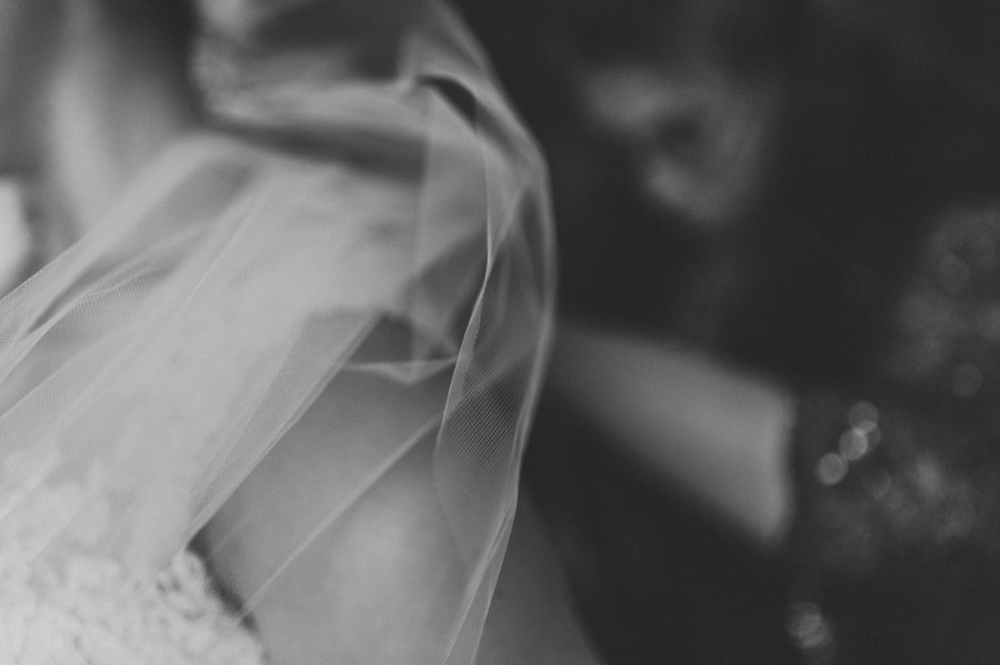 black and white photo of brides veil