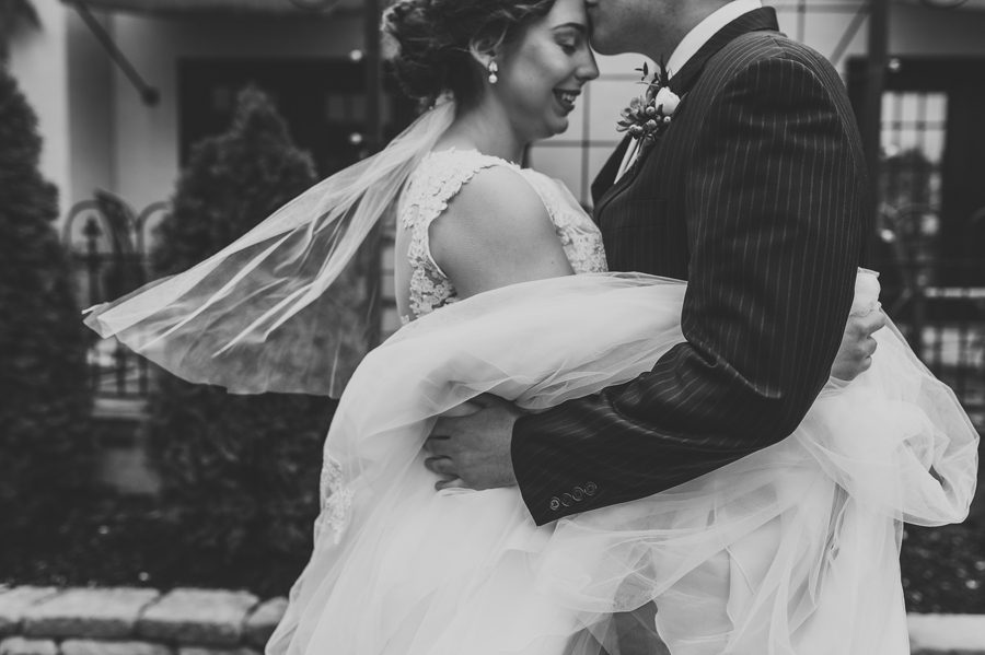 black and white close up photo of brides wedding dress