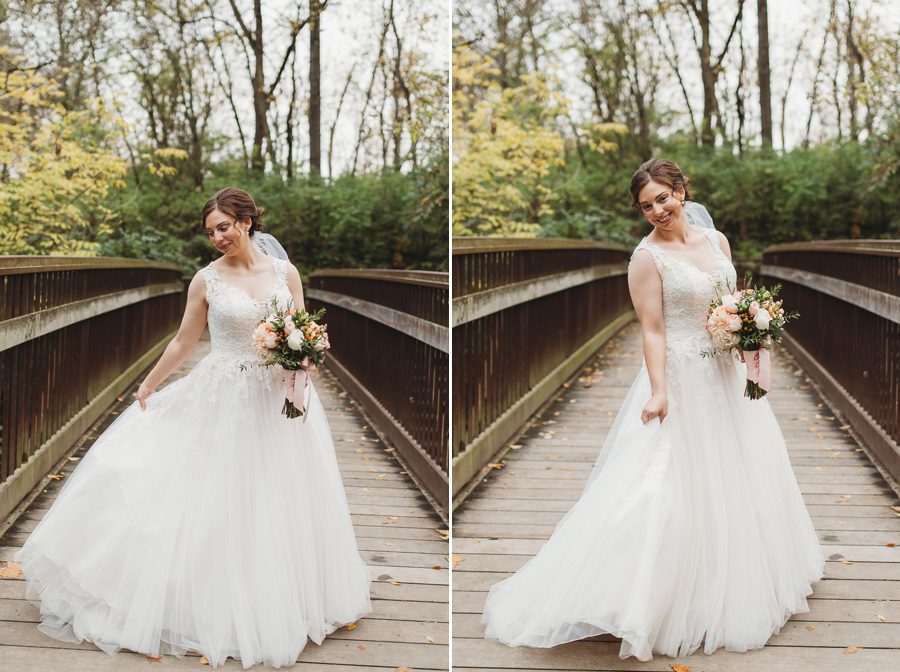 bride twirling wedding dress on bridge at indian run falls in dublin ohio