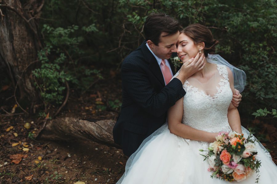 close up photo of groom going in for a kiss at indian run falls