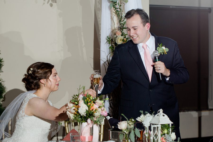 married couple toasting glasses