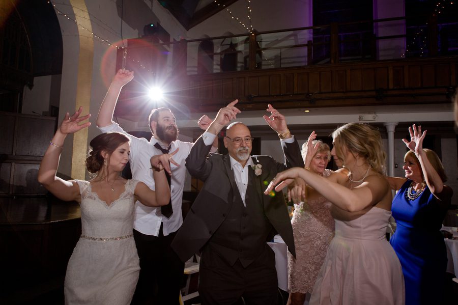 wedding reception of guests dancing