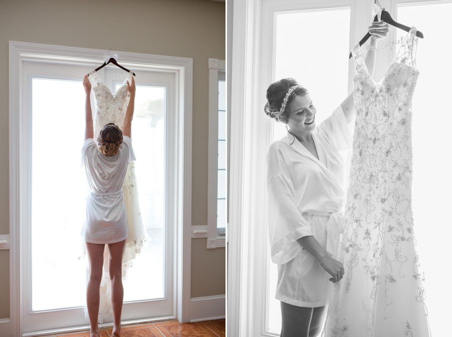 bride looking at wedding dress on hanger