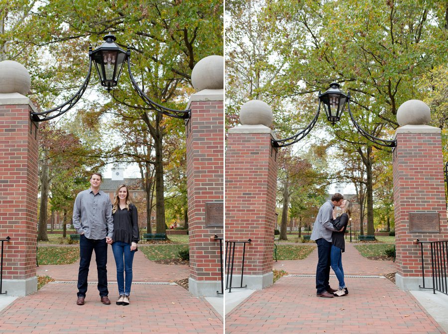 engaged couple kissing on campus