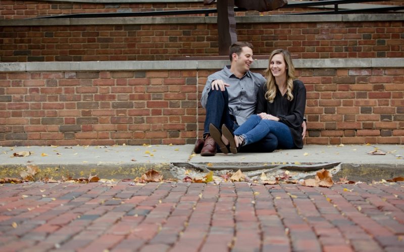 groom laughing at bride to be at Ohio University engagement