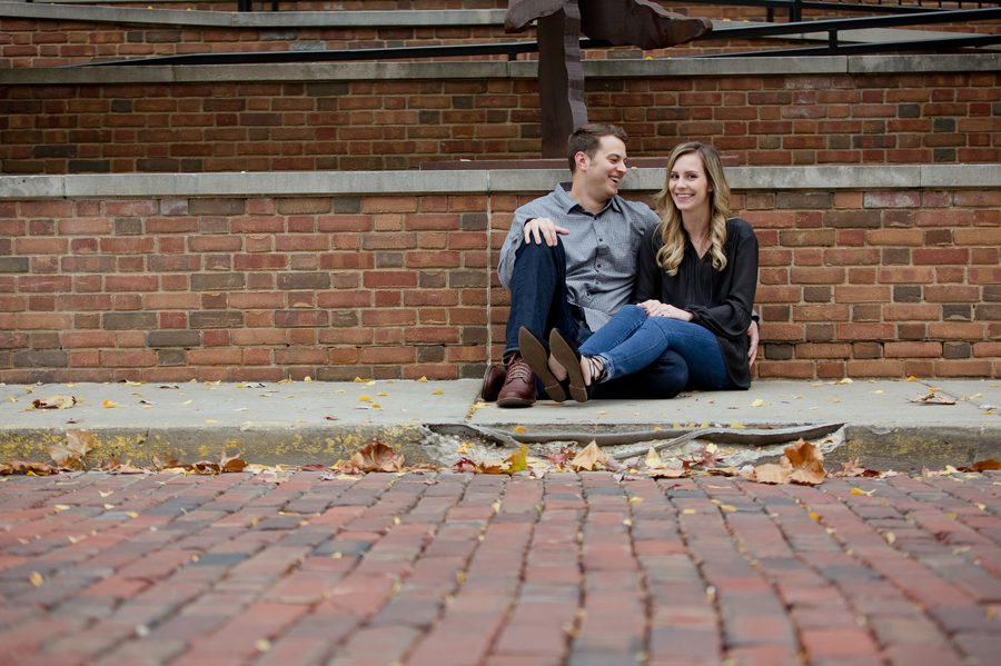 groom laughing at bride to be at Ohio University engagement