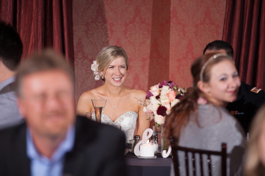 bride laughing during toast