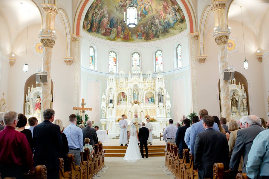 wedding ceremony at immculate conception parish near grand lake galleria
