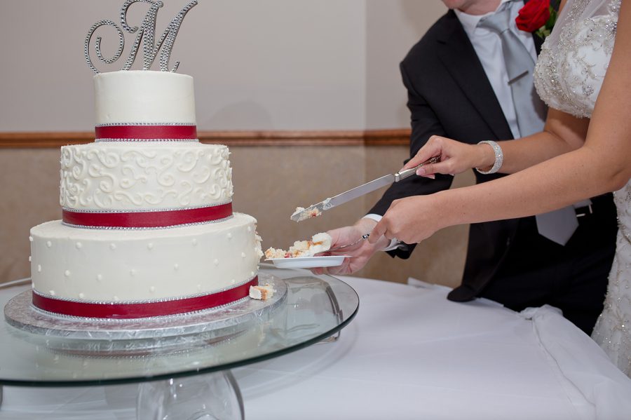couple cutting cake
