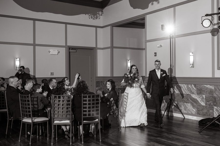 bride and groom announced into Noah's Event Venue wedding reception