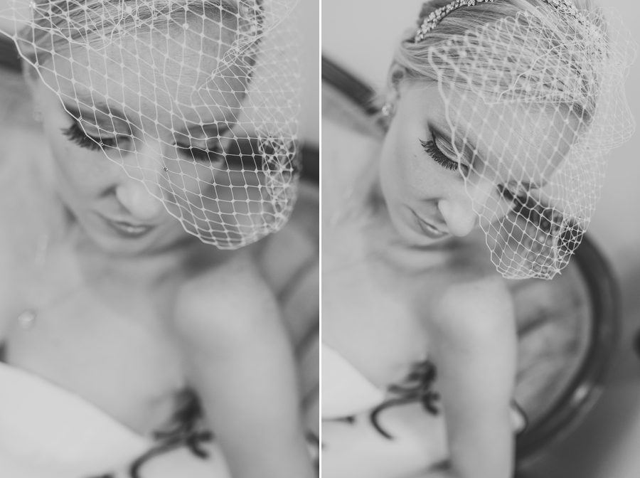 black and white photo of brides bird cage veil