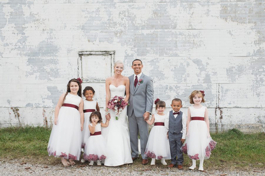bride and groom with flowergirls and ring bearer