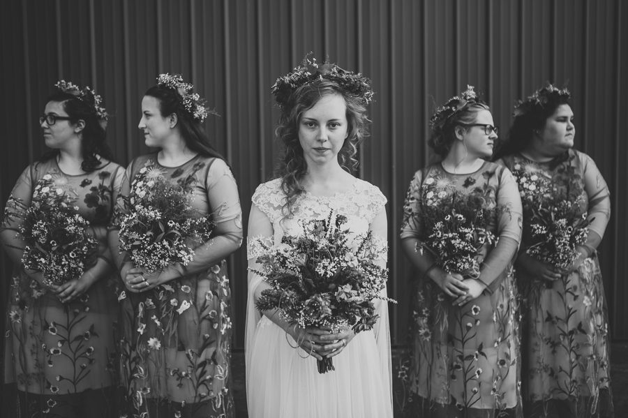 black and white photo of bride with bridesmaids
