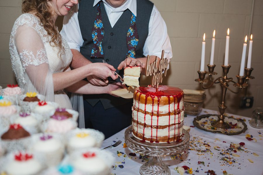 close up of cake cutting at newark ohio wedding