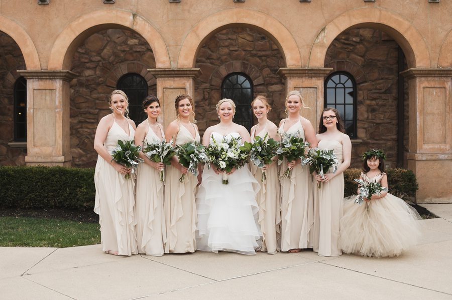 bride with bridesmaids in champagne dresses