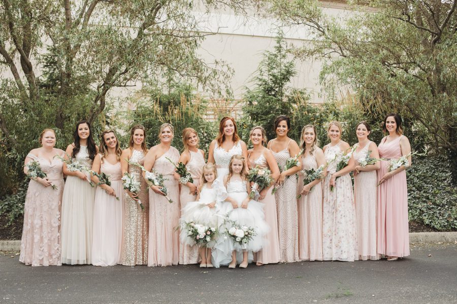bridesmaids in mixed patterned dresses at Brookshire event center