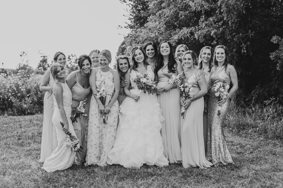 black and white candid bridesmaids photo at Brookshire Event Center