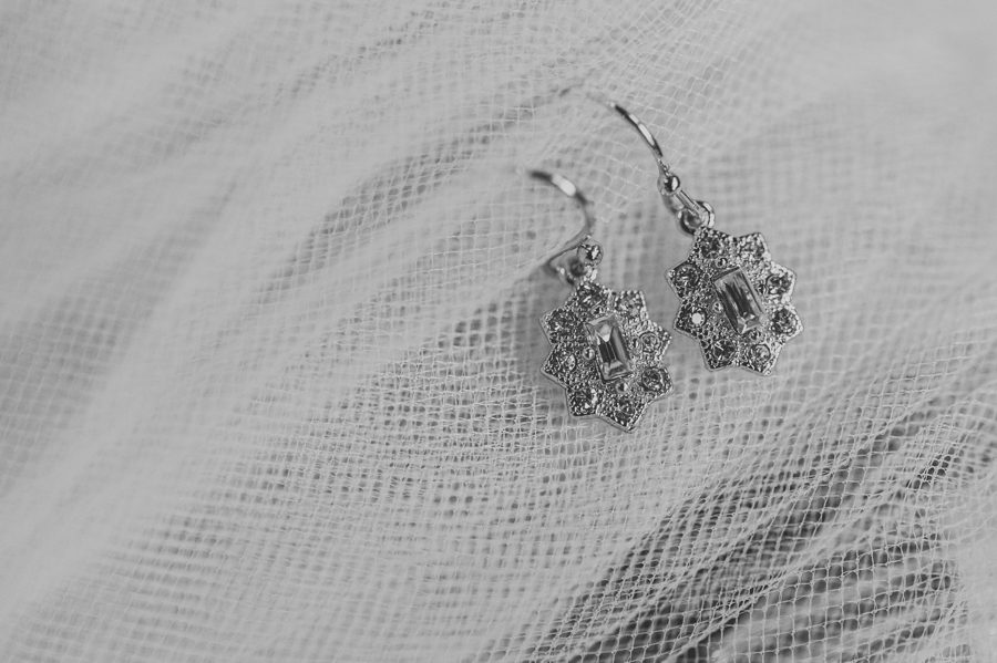 black and white photo of bridal earrings