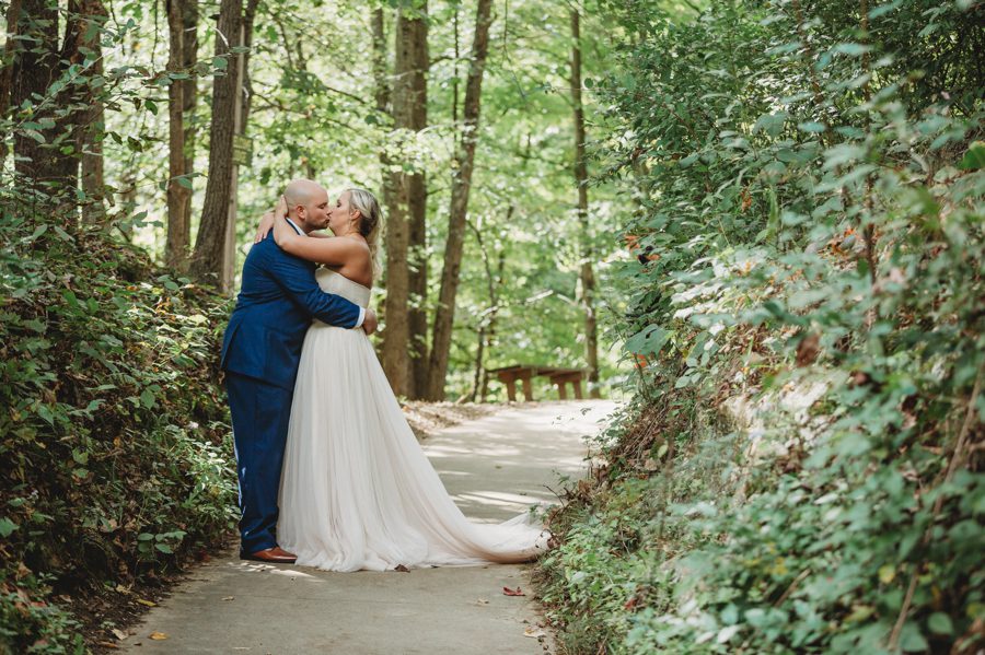 couple kissing on path at Butler Ohio Wedding Photos