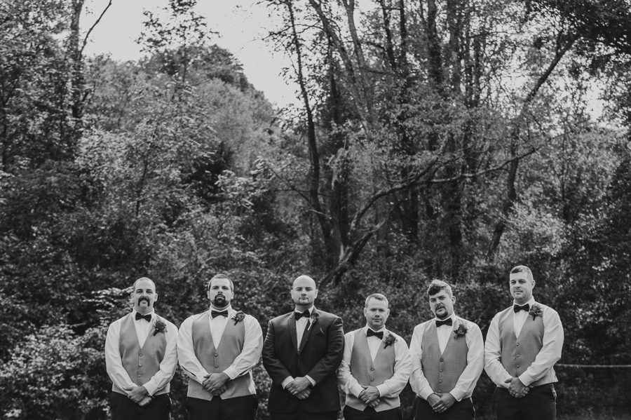 groom with groomsmen lined up next to each other at Butler Ohio Wedding Photos